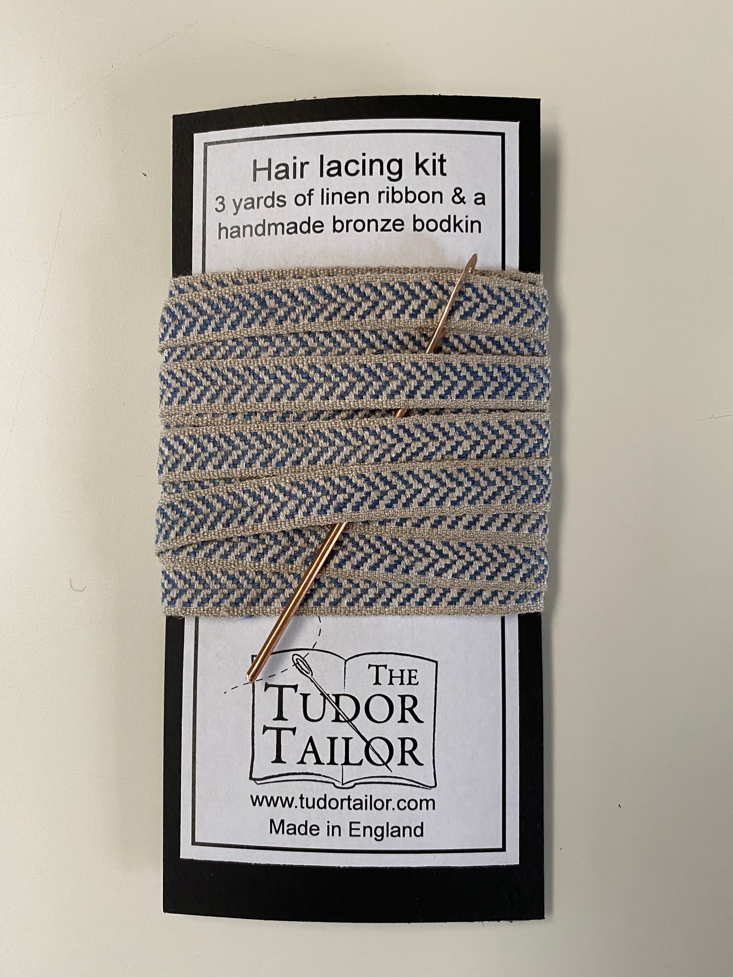 Hair lacing kit in various colours for Tudor or Elizabethan reenactment featuring bronze bodkin and linen ribbon