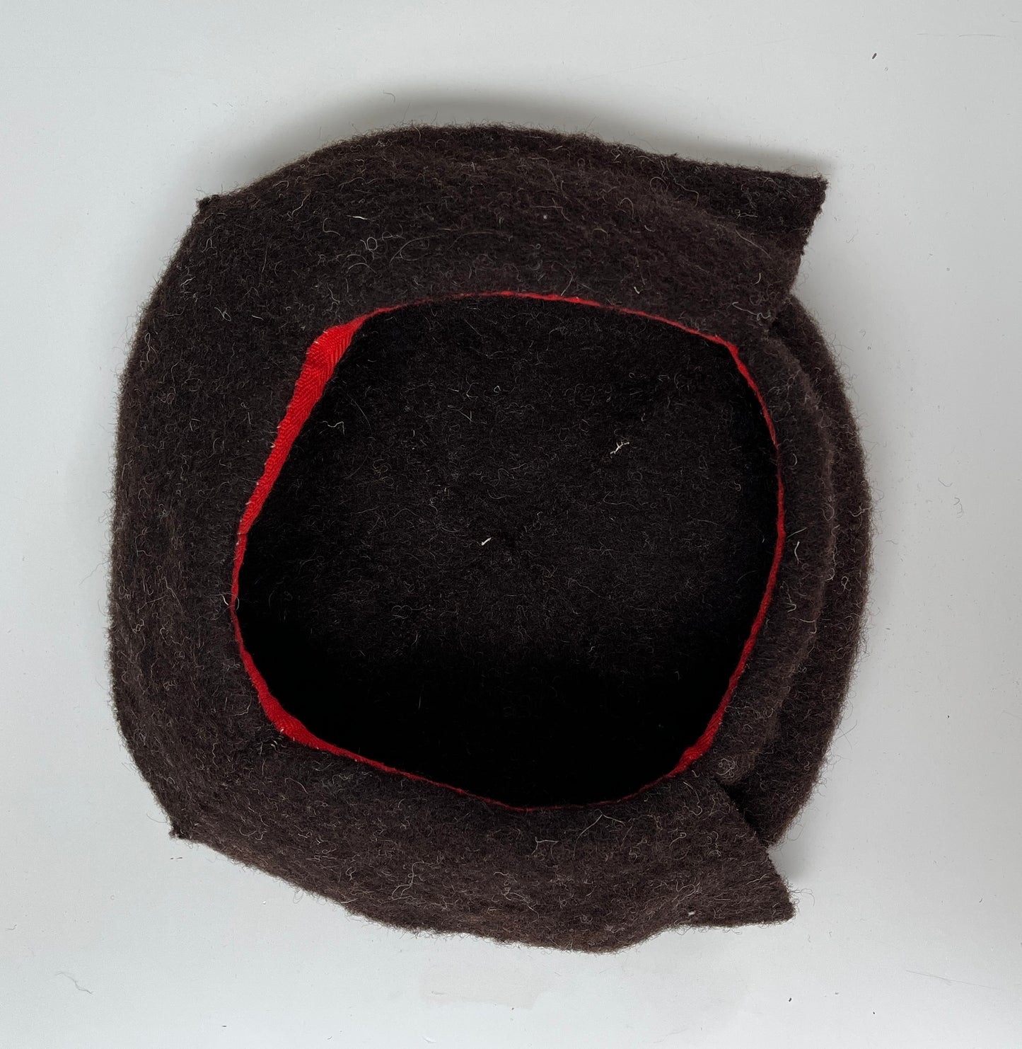 Finished garment - Frieze wool man's bonnet as featured in The Typical Tudor
