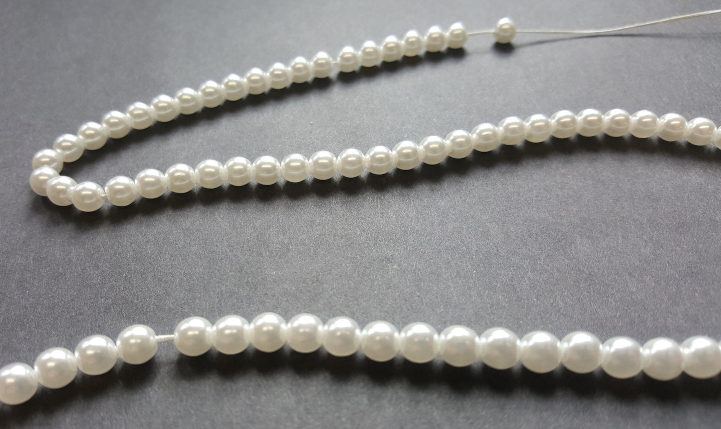 String of Czech glass imitation white pearls, ideal for Elizabethan and other Tudor reenactment or historical dress, available in three sizes