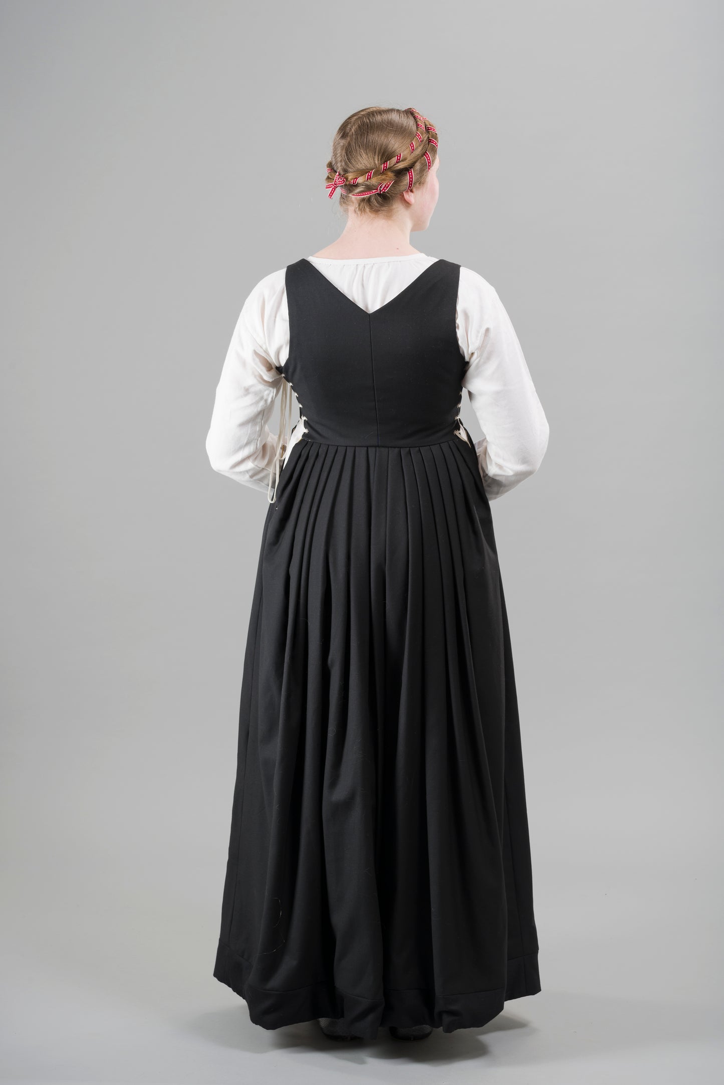 Finished garment - Tudor woman's black worsted kirtle as featured in The Typical Tudor