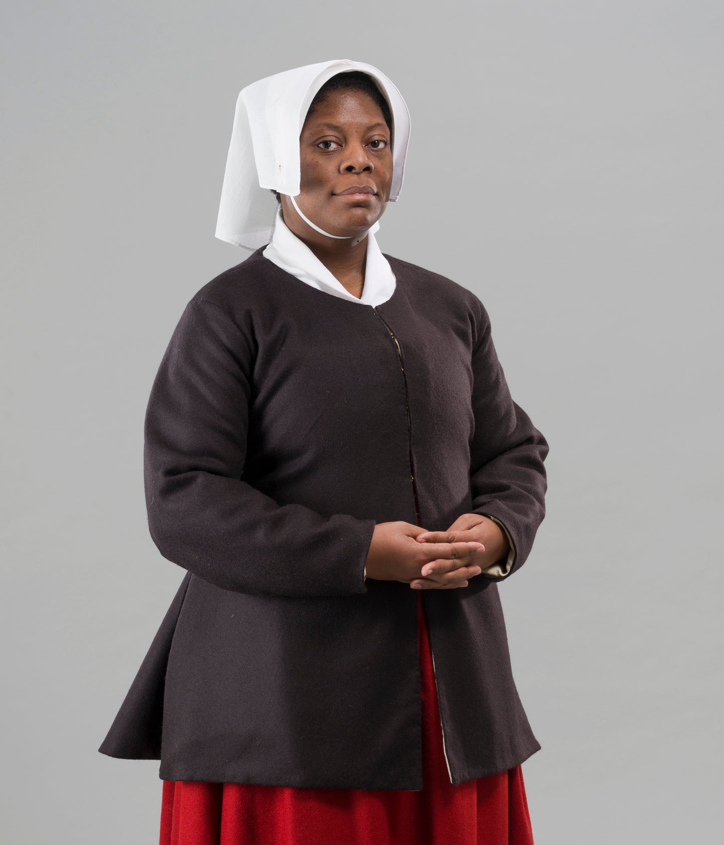 Finished garment - Tudor woman's mid-century 'poor black' coat as featured in The Typical Tudor