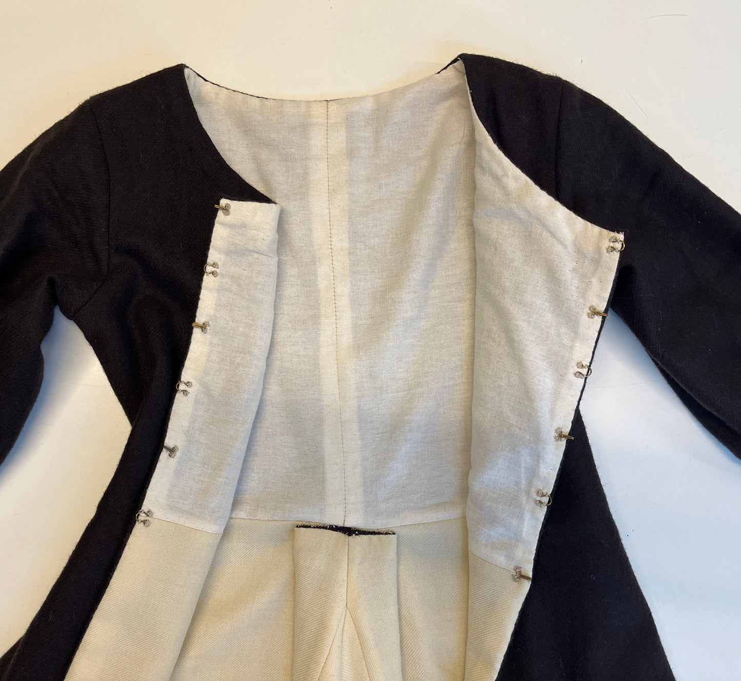 Finished garment - Tudor woman's mid-century 'poor black' coat as featured in The Typical Tudor
