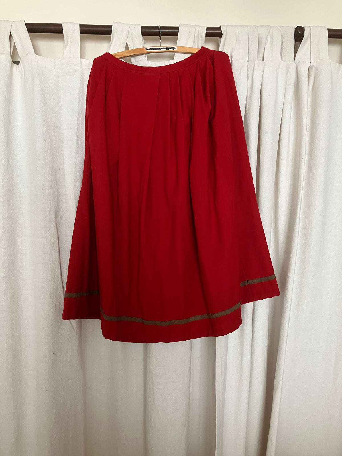 Finished garment - Tudor woman's red worsted petticoat skirt with wool tape guard