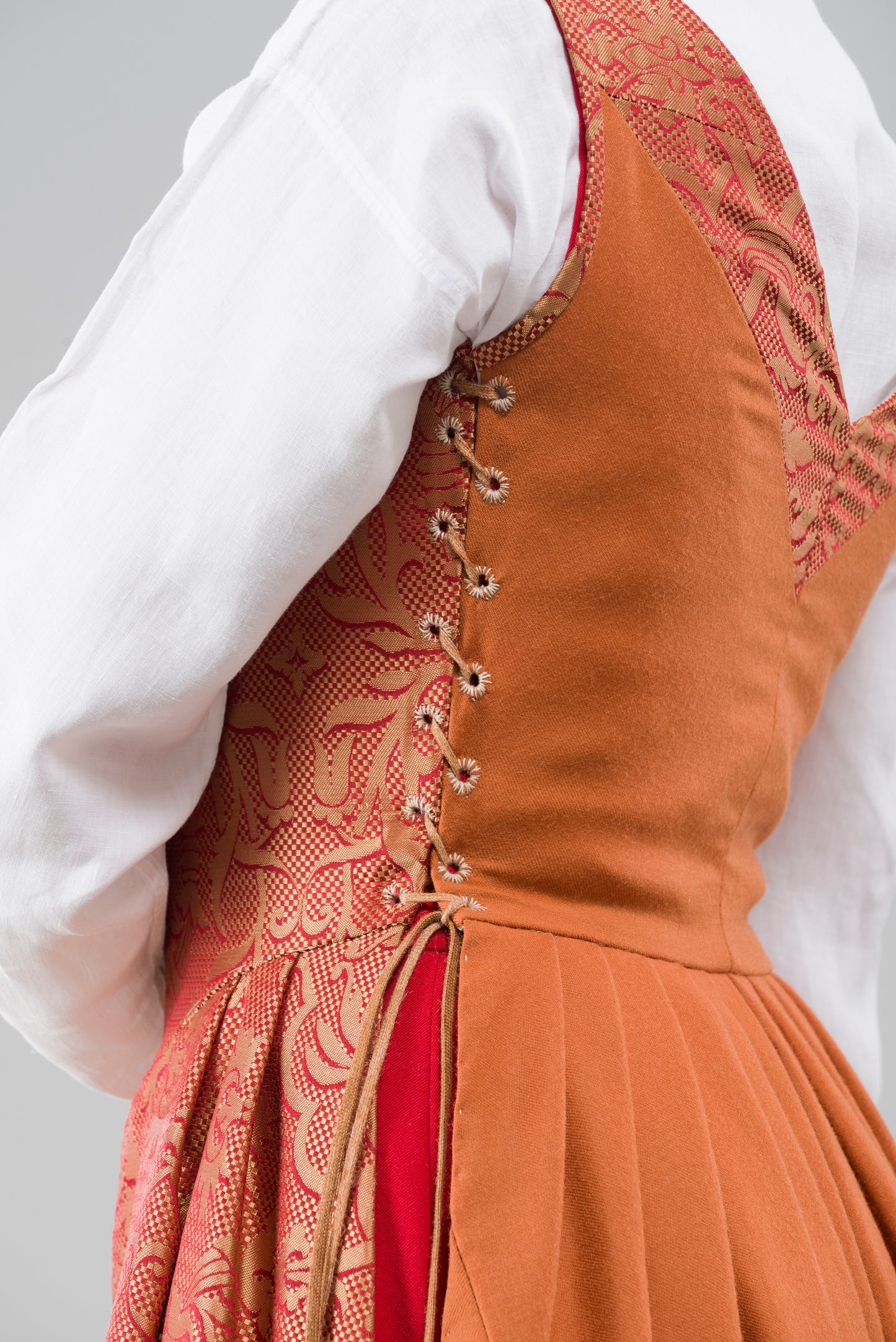 Finished garment - Tawny silk damask and worsted kirtle as featured in The Typical Tudor