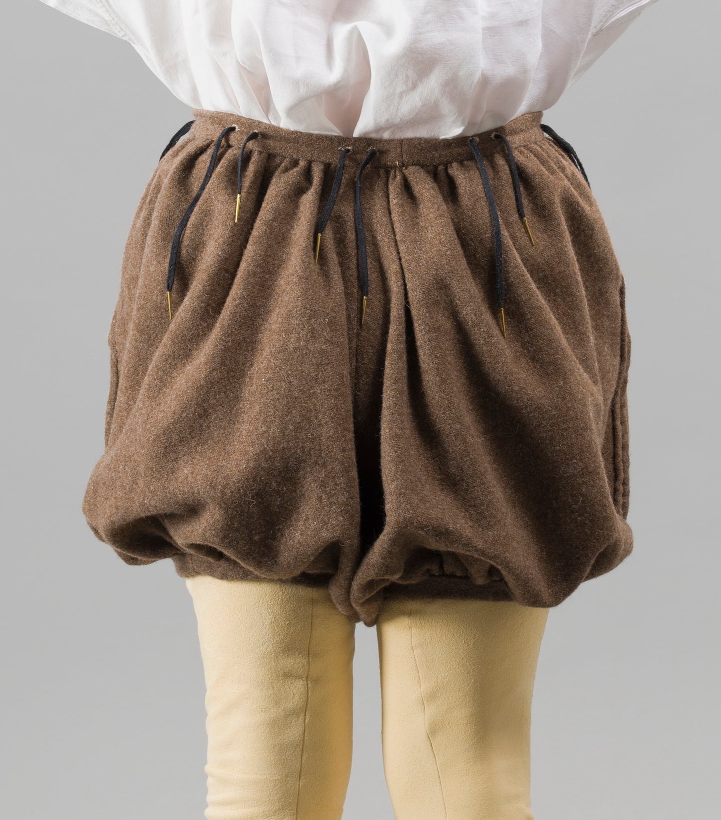 Finished garment - Man's mid-century russet wool round hose as featured in The Typical Tudor