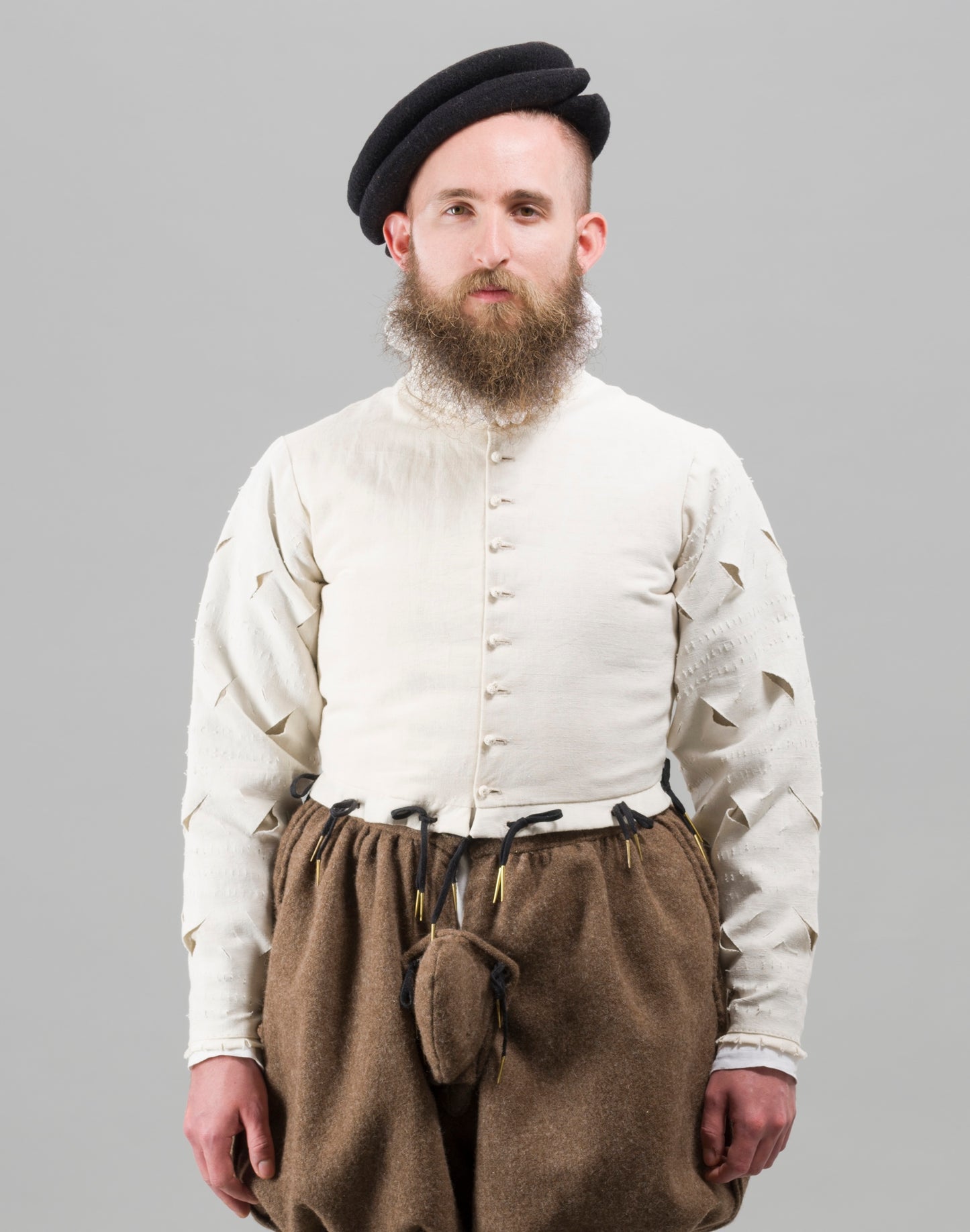 Finished garment - Man's mid-century slashed canvas doublet as featured in The Typical Tudor