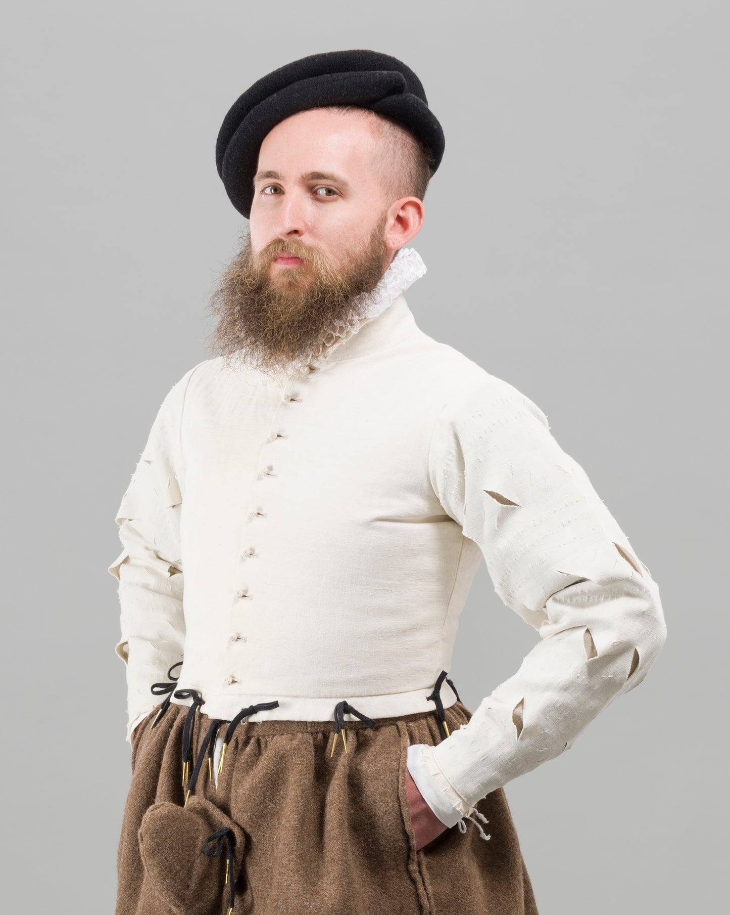 Finished garment - Man's mid-century slashed canvas doublet as featured in The Typical Tudor