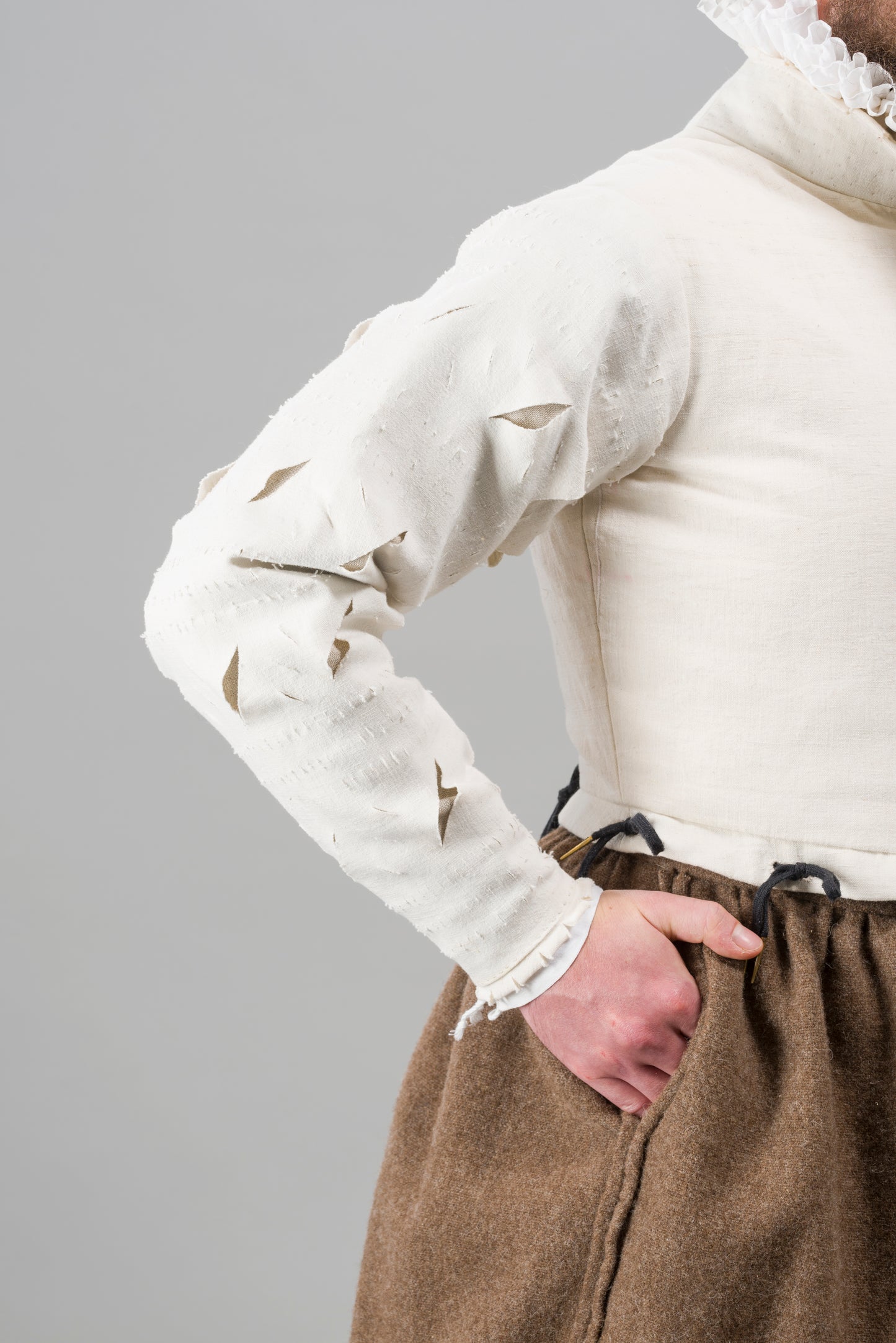 Finished garment - Man's mid-century slashed canvas doublet as featured in The Typical Tudor