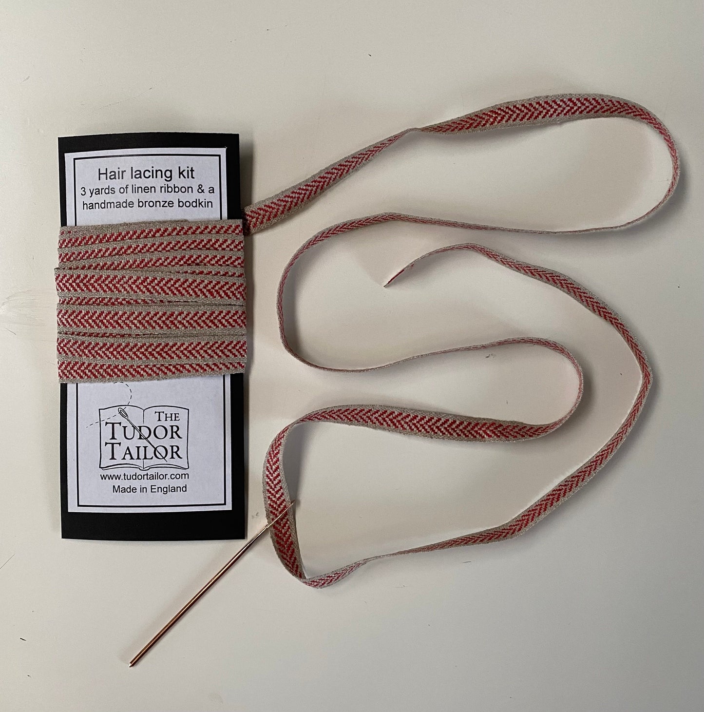 Hair lacing kit in various colours for Tudor or Elizabethan reenactment featuring bronze bodkin and linen ribbon